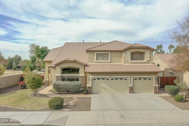 view of front of home with a garage