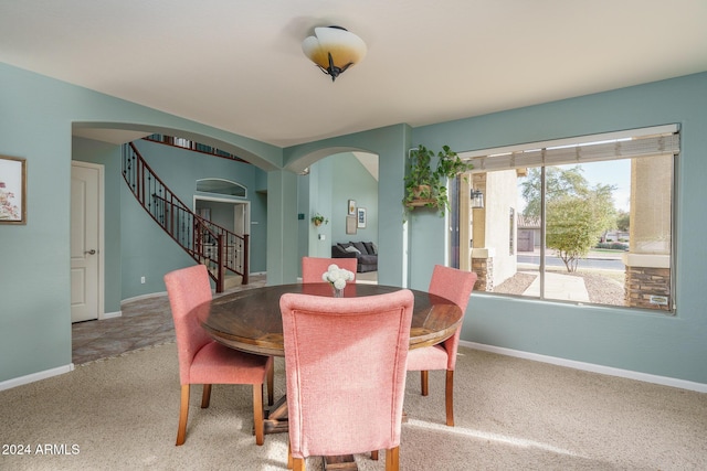 view of carpeted dining space