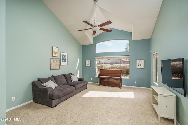 living room with carpet flooring, ceiling fan, and high vaulted ceiling