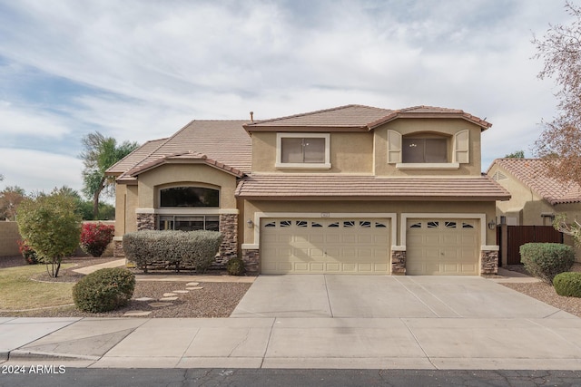 view of front of property featuring a garage