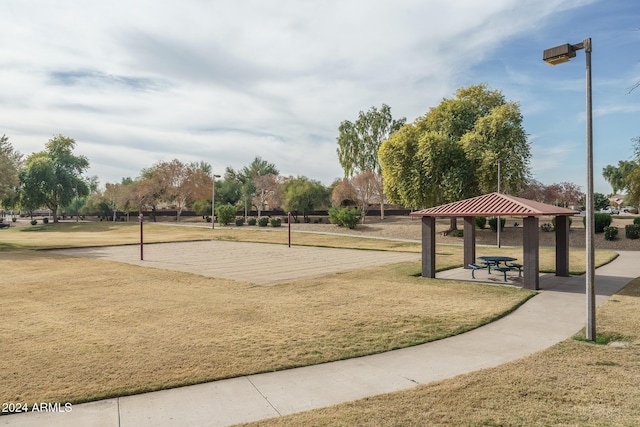 view of property's community with a gazebo and a lawn