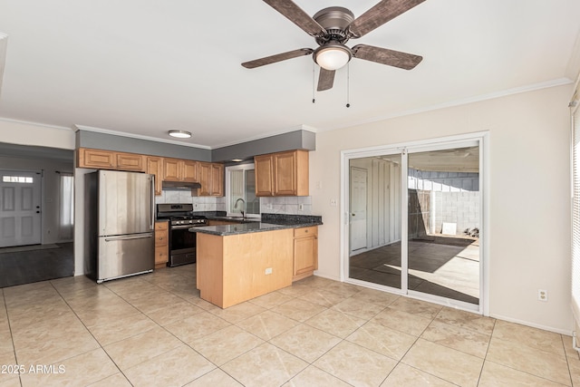 kitchen with dark stone countertops, decorative backsplash, sink, appliances with stainless steel finishes, and light tile patterned floors