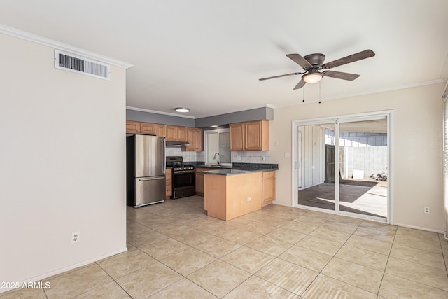 kitchen featuring backsplash, kitchen peninsula, sink, stainless steel appliances, and light tile patterned floors