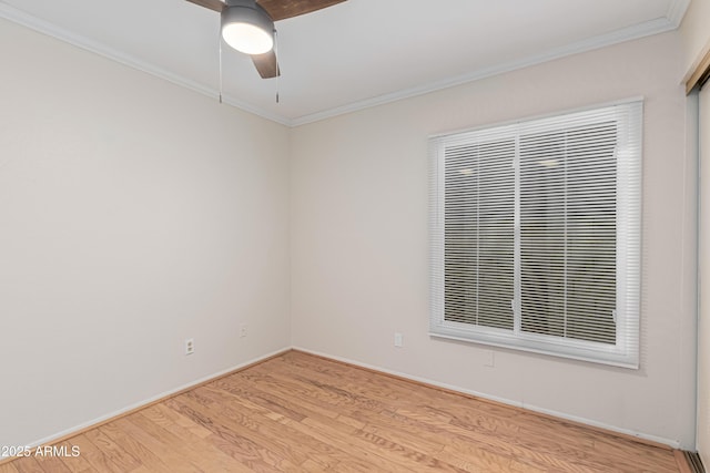 unfurnished room with ceiling fan, crown molding, and light hardwood / wood-style floors