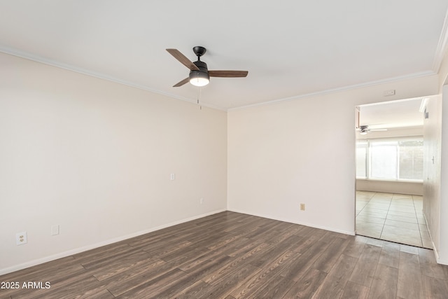 unfurnished room with ceiling fan, dark hardwood / wood-style floors, and ornamental molding