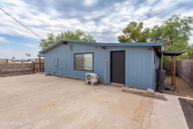 rear view of property with a patio area