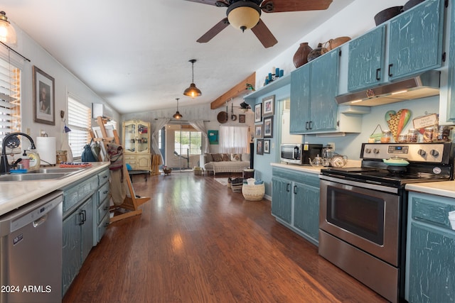 kitchen with sink, stainless steel appliances, dark hardwood / wood-style flooring, blue cabinets, and decorative light fixtures