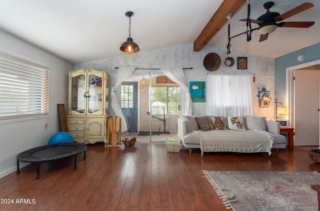 living room with vaulted ceiling with beams, dark hardwood / wood-style floors, and ceiling fan