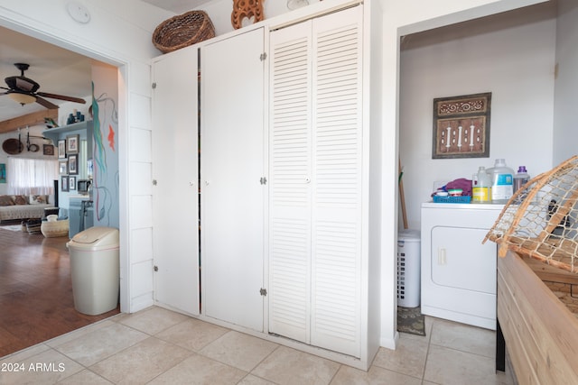 washroom with ceiling fan, light tile patterned floors, and washer / dryer