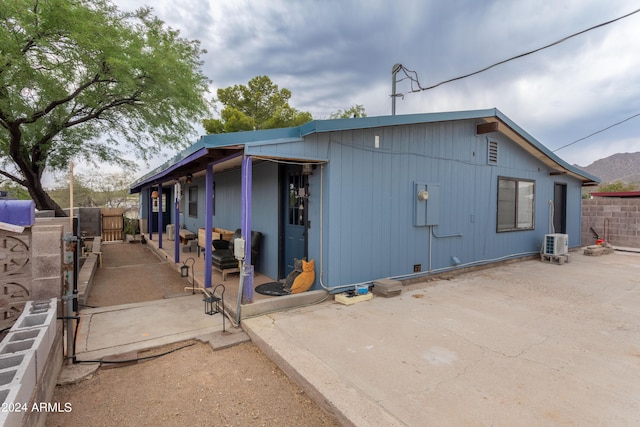 view of property exterior featuring a patio