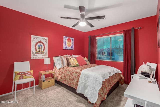 bedroom with carpet floors and a ceiling fan