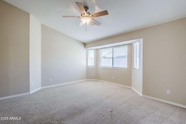 43205 W Oster Dr, Maricopa, AZ 85138 - carpeted spare room with a ceiling fan and baseboards