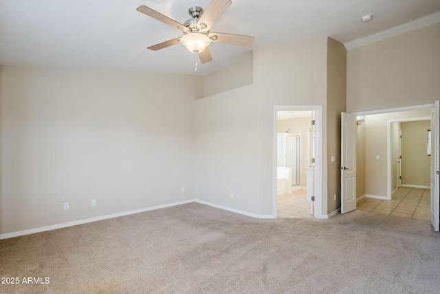 43205 W Oster Dr, Maricopa, AZ 85138 - unfurnished bedroom with carpet, high vaulted ceiling, baseboards, ensuite bath, and a ceiling fan