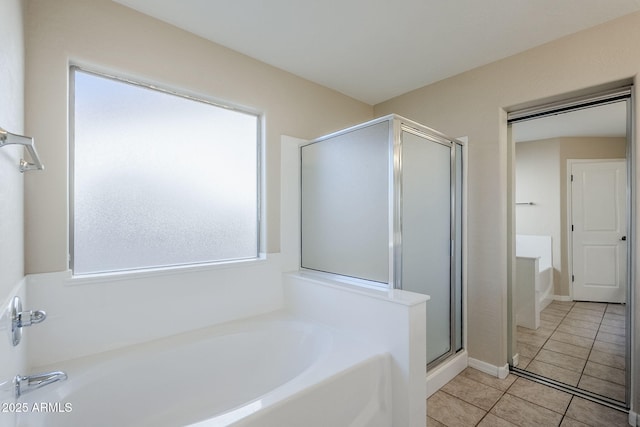 43205 W Oster Dr, Maricopa, AZ 85138 - bathroom featuring a garden tub, tile patterned flooring, and a shower stall