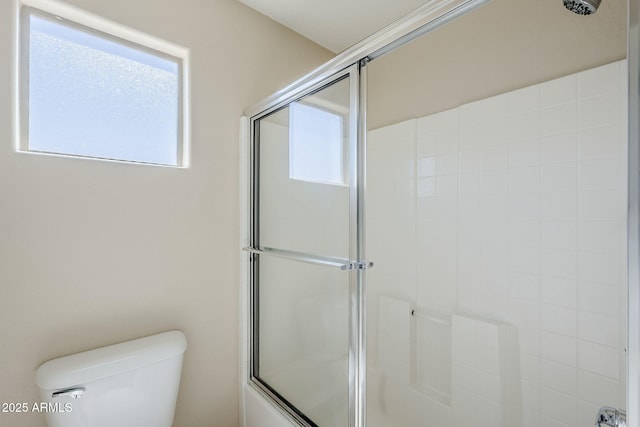 43205 W Oster Dr, Maricopa, AZ 85138 - bathroom with toilet and combined bath / shower with glass door