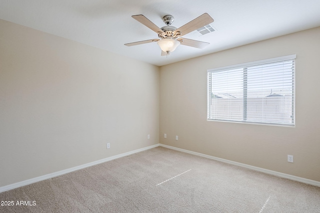 43205 W Oster Dr, Maricopa, AZ 85138 - unfurnished room featuring light carpet, baseboards, and ceiling fan