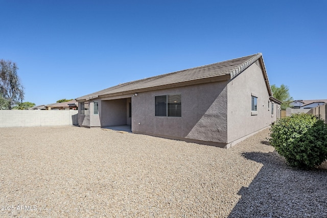 43205 W Oster Dr, Maricopa, AZ 85138 - back of property featuring stucco siding and a tile roof