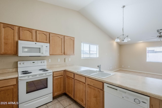 43205 W Oster Dr, Maricopa, AZ 85138 - kitchen with white appliances, a sink, lofted ceiling, healthy amount of natural light, and a chandelier