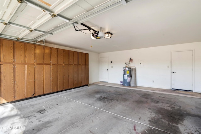 garage featuring a garage door opener and water heater