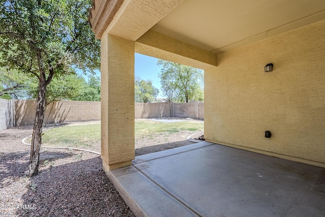 view of patio featuring a fenced backyard