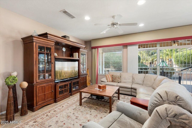 living room featuring ceiling fan