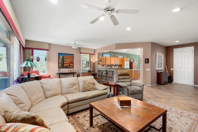 living room featuring ceiling fan