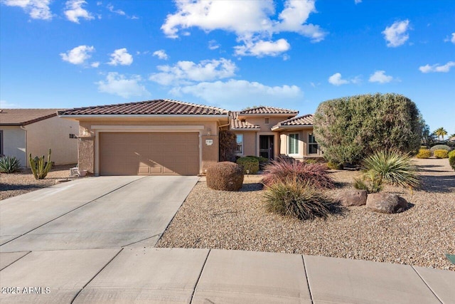 view of front of property featuring a garage