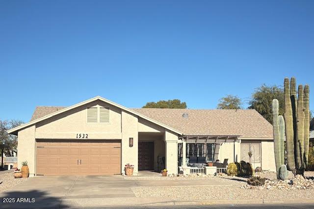 single story home featuring a garage