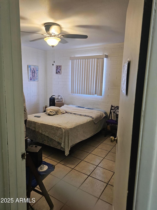 4426 S 36th Dr, Phoenix, AZ 85041 - bedroom with light tile patterned floors and ceiling fan