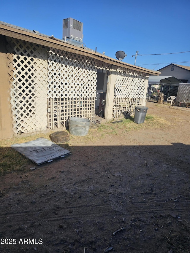 4426 S 36th Dr, Phoenix, AZ 85041 - view of yard featuring central AC