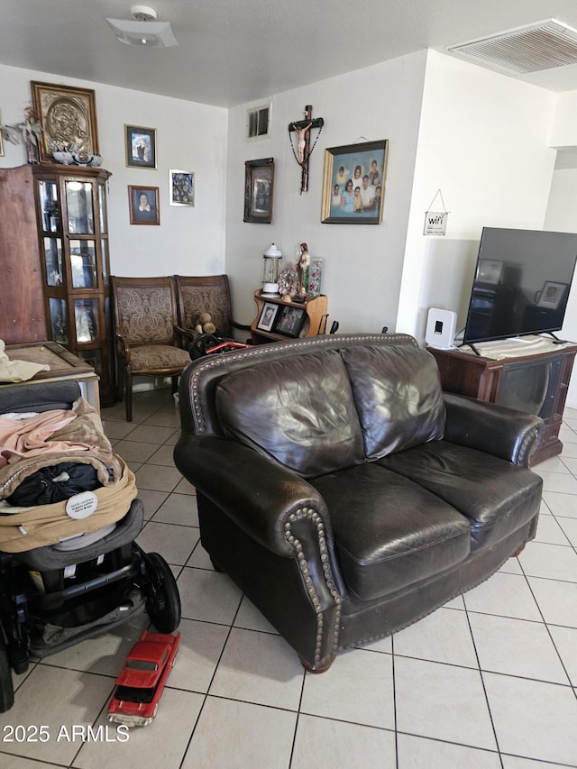 4426 S 36th Dr, Phoenix, AZ 85041 - living room with visible vents and light tile patterned floors