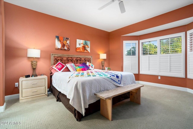 bedroom featuring ceiling fan and carpet flooring