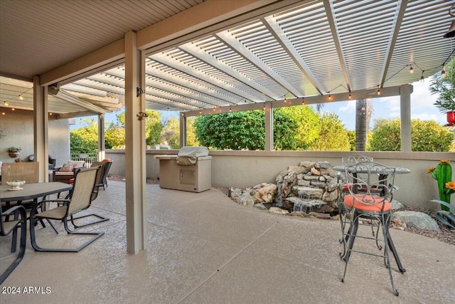 view of patio / terrace featuring a pergola