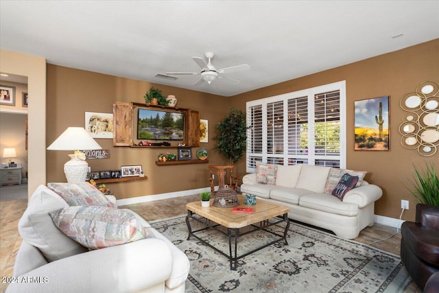 living room featuring ceiling fan