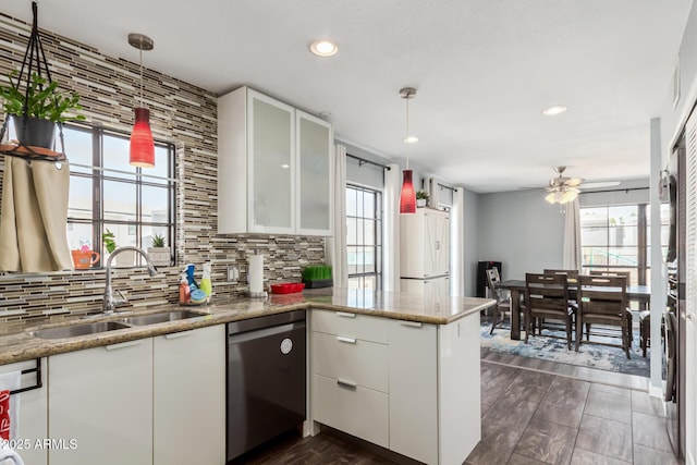 kitchen with glass insert cabinets and white cabinets