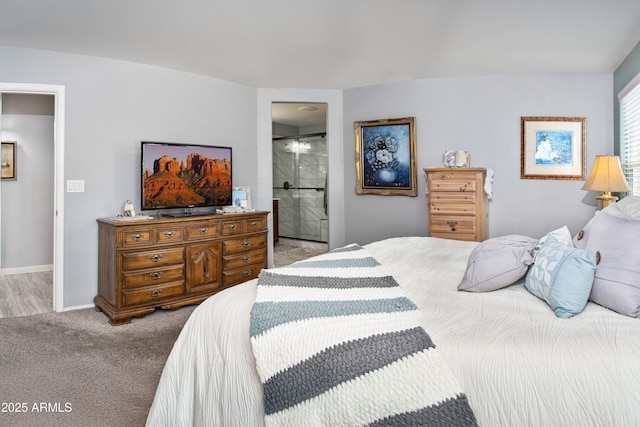 907 E Kelsi Ave, San Tan Valley, AZ 85140 - bedroom with carpet floors, baseboards, and ensuite bath