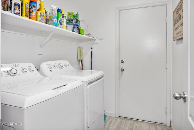 907 E Kelsi Ave, San Tan Valley, AZ 85140 - washroom featuring washer and clothes dryer and light wood-style flooring