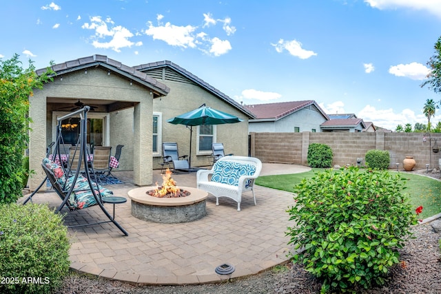 907 E Kelsi Ave, San Tan Valley, AZ 85140 - view of patio / terrace featuring a fire pit and a ceiling fan