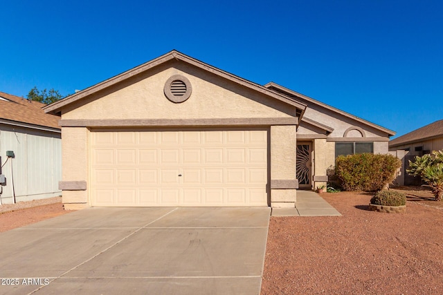 single story home featuring a garage