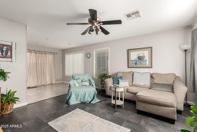 tiled living room featuring ceiling fan