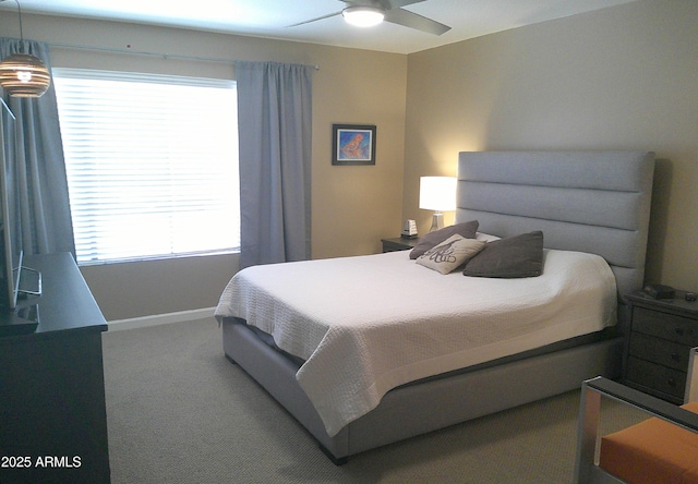8700 E Mountain View Rd Unit 2029, Scottsdale, AZ 85258 - bedroom with carpet flooring, baseboards, and a ceiling fan