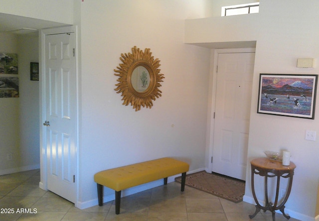 8700 E Mountain View Rd Unit 2029, Scottsdale, AZ 85258 - foyer entrance featuring light tile patterned floors and baseboards