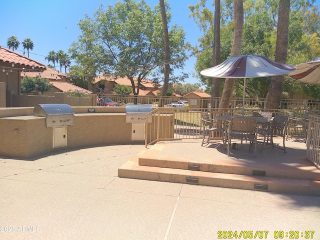 8700 E Mountain View Rd Unit 2029, Scottsdale, AZ 85258 - view of patio with outdoor dining area