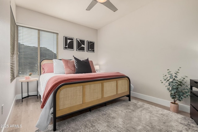 7887 N 16th St Unit 224, Phoenix, AZ 85020 - bedroom featuring wood finished floors and a ceiling fan