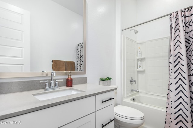 full bathroom featuring toilet, vanity, and shower / tub combo with curtain