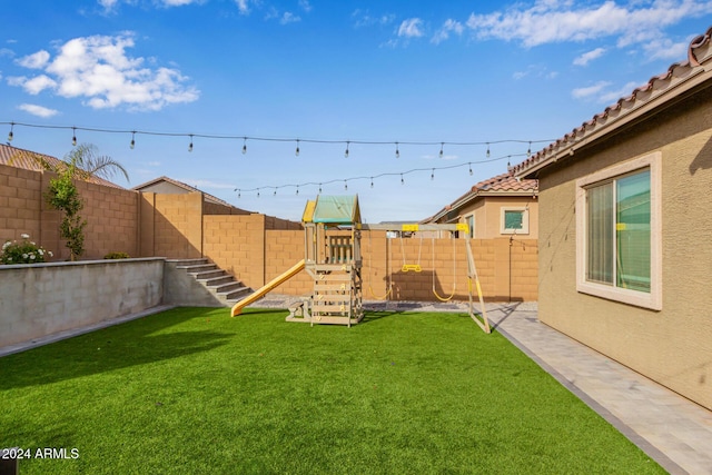 view of yard featuring a playground