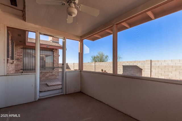 view of patio with a balcony and ceiling fan