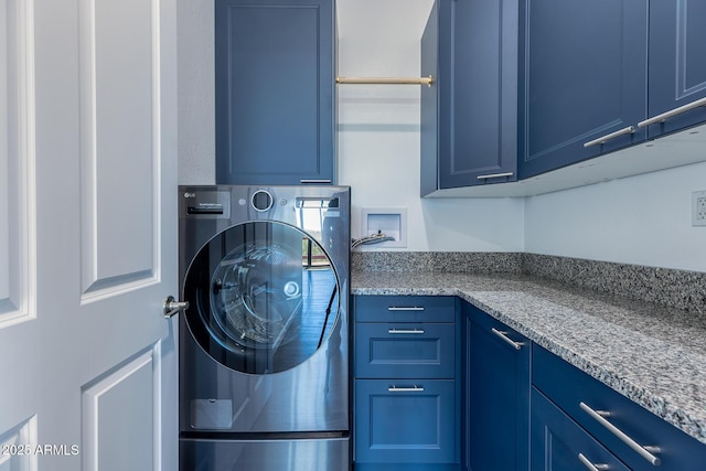 2943 E Lookout Ln, Overgaard, AZ 85933 - washroom with cabinet space and washer / clothes dryer