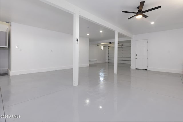 2943 E Lookout Ln, Overgaard, AZ 85933 - garage with baseboards, a ceiling fan, a baseboard heating unit, and recessed lighting