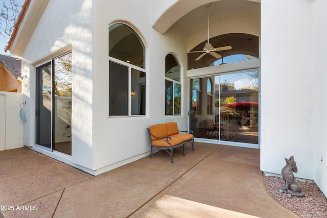 view of patio with ceiling fan